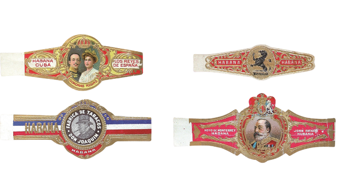 Cuatro anillas históricas cubanas con retratos, escudos y marcas de tabaco