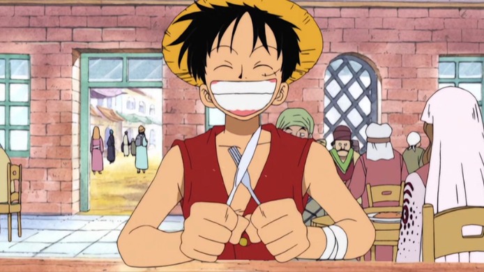 Monkey D. Luffy, protagonista de One Piece, esperando su comida