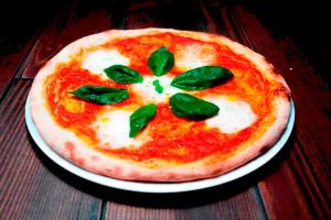 Una pizza para una Reina